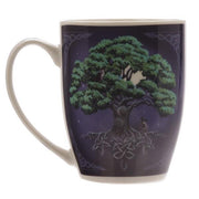 Mug with a tree design on a dark background