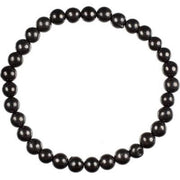 Black beaded bracelet on a white background