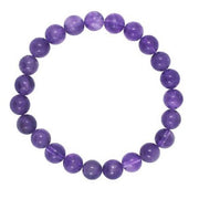 Purple beaded bracelet on a white background