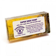 A rectangular bar of handmade soap labeled 'SUPER SAGE SOAP' by 'Fluorescent Ranch' with a white paper label, photographed on a plain white background.
