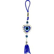 Heart-shaped evil eye charm with tassels on a white background