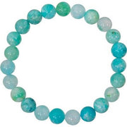 Turquoise and green beaded bracelet on a white background