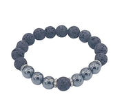 Bracelet with dark gray beads and silver accents on a white background