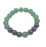 Bracelet with green and gray beads on a white background