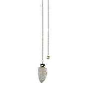 Pendulum with a clear crystal quartz on a white background