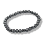 Black beaded bracelet on a white background