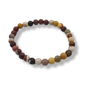 Multicolored beaded bracelet on a white background