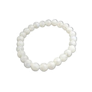 White beaded bracelet on a white background