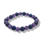 Purple and blue beaded bracelet on a white background