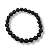 Black beaded bracelet on a white background