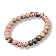 Multicolored beaded bracelet on a white background