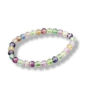 Multicolored beaded bracelet on a white background