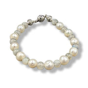 Pearl and labradorite bracelet and with silver clasp on a white background